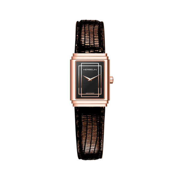 REF: 17577PR04BR  Montre Femme MICHEL HERBELIN de la collection ART DECO 1925's. Minimaliste et graphique, Art Déco 1925’s arbore un boitier en PVD or rose rectangulaire. Le cadran noir laqué recouvert de deux rectangles graphiques donne une allure raffinée et moderne à ce modèle. Accompagné d’un bracelet en cuir rose, cette montre HERBELIN possède une élégance minimaliste.