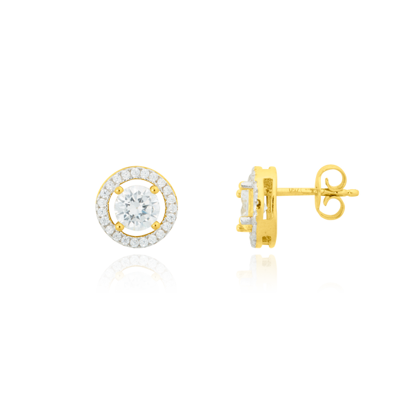 Boucles d'oreilles clous rondes, serties d'un zirconium central et son contour pavé de zirconiums, en Or Jaune 18 Carats - 750/000   Offrir une boucle d'oreille c'est être sûr que le cadeau plaira.   CARACTERISTIQUES  Largeur (mm) : 9.2 Poids (gr) : 2.41     Matière : Or 18 Carats - 750/000 18693