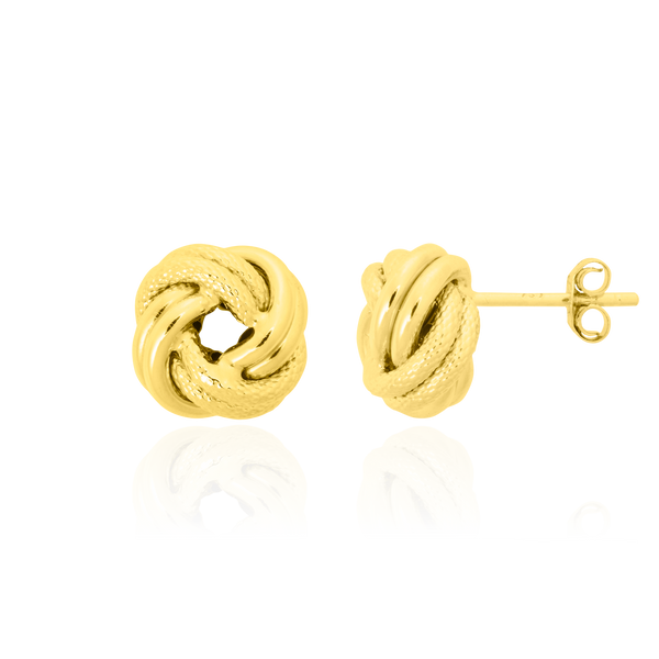 Boucles d'oreilles clous Nœud, 2 branches alternées diamantées et lisses, en Or Jaune 18 Carats - 750/000.  Offrir une boucle d'oreille c'est être sûr que le cadeau plaira.   CARACTERISTIQUES :  Poids en 8mm (gr) : 0.97  Poids en 12mm (gr) : 2.04 Poids en 16mm (gr) : 3.46  Matière : Or 18 Carats - 750/000 20892-20893-20891