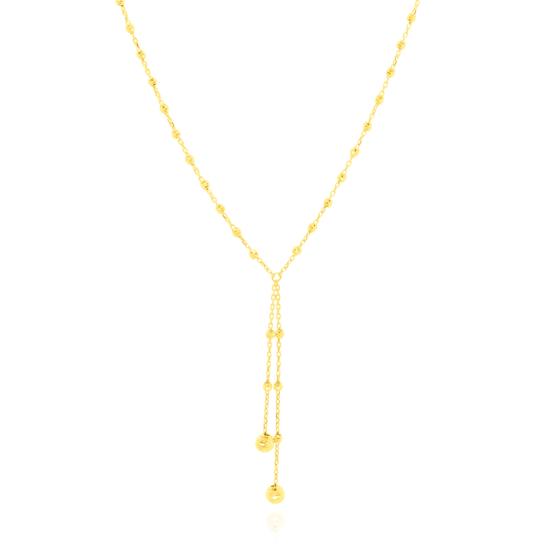 Collier cravate orné de grain d’or ciselé, sur une chaine forçat massive, en Or Jaune 18 Carats - 750/000.  Symbole d'amitié ou de séduction, chaînes et colliers n'ont qu'un but : sublimer votre cou.    CARACTERISTIQUES :  Longueur (cm) : 45.00 Hauteur pampilles (cm) : 4.50 Poids (gr) : 3.94 Matière : Or 18 Carats - 750/000 20071 