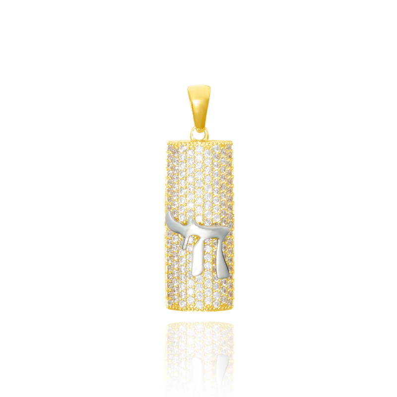 Pendentif Haï pavé zirconiums en Or Jaune et Or Blanc 18 Carats - 750/000.     CARACTERISTIQUES :  Dimensions H x l (mm) : 21.9 x 9.06 Poids (gr) : 2.18 Matière : Or 18 Carats - 750/000 20228 