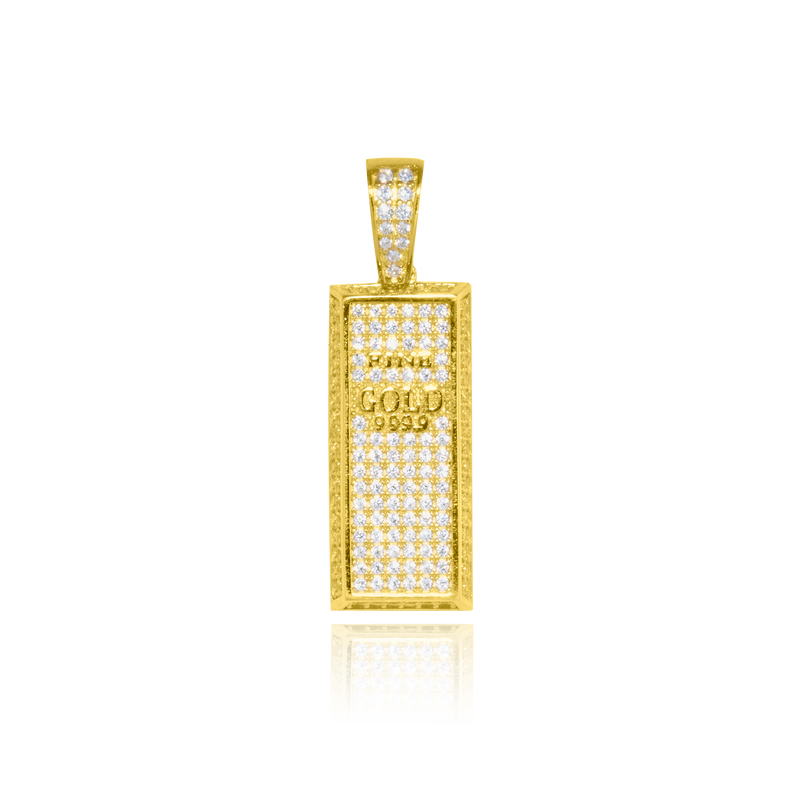 Pendentif en forme de Lingot serti de zirconiums d'Or en Or Jaune 18 Carats - 750/000.     CARACTERISTIQUES :  Dimensions H x l (mm) : 34.3 x 11.3  Poids (gr) : 5.42 Matière : Or 18 Carats - 750/000 20443