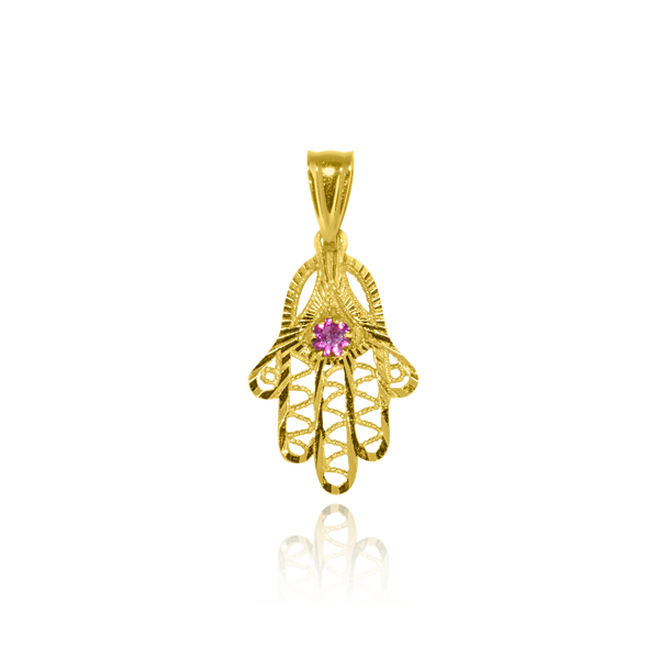 Pendentif en forme de main de Fatima sertie d'un zirconium rouge, en Or Jaune 18 Carats - 750/000.   CARACTERISTIQUES :  Dimensions H x l (mm) : 17.3 x  12.7 Poids (gr) : 0.88 Matière : Or 18 Carats - 750/000 20448