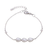 Bracelet monté de 3 poires articulées serties de zirconiums, en Argent - 925/000 rhodié ou rosé.  Qu'il soit classique ou fantaisiste, le bracelet saura sans conteste faire plaisir.   CARACTERISTIQUES :  Poids (gr) : Matière : Argent - 925/000 