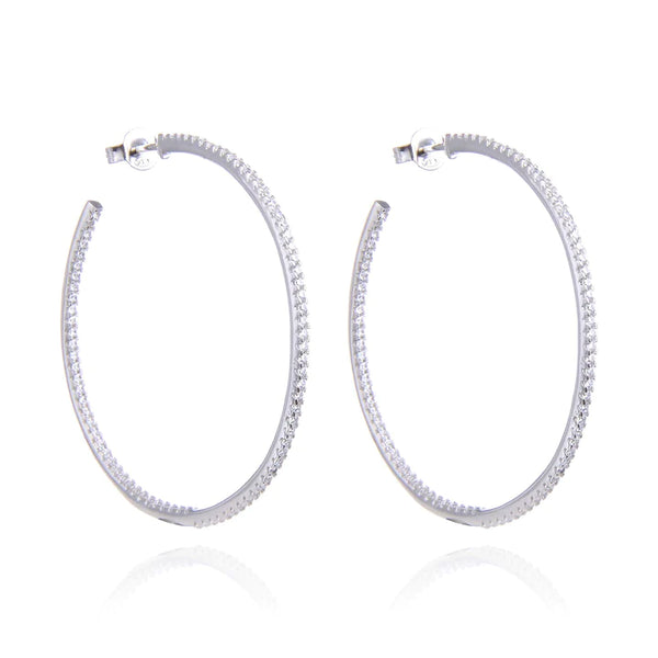 Boucles d'oreilles créoles rhodiées, rosées ou dorées, serties zirconiums, en Argent - 925/000.  Les créoles, véritables accessoires de mode intemporels, ajoutent une touche d'élégance à n'importe quelle tenue.   CARACTERISTIQUES :  Poids (gr) : 9.70 Diamètre (cm): 6.00 Matière : Argent - 925/000  19898 - 20463