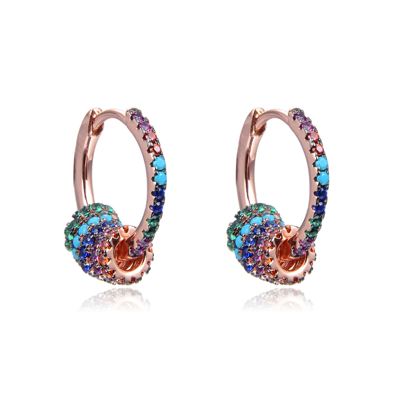 Boucles d'oreilles créoles, rhodiées ou rosées, serties de zirconiums multicolores, en Argent - 925/000.  Les créoles, véritables accessoires de mode intemporels, ajoutent une touche d'élégance à n'importe quelle tenue.  CARACTERISTIQUES :  Poids (gr) : 3.20 Matière : Argent - 925/000  19862 - 20488