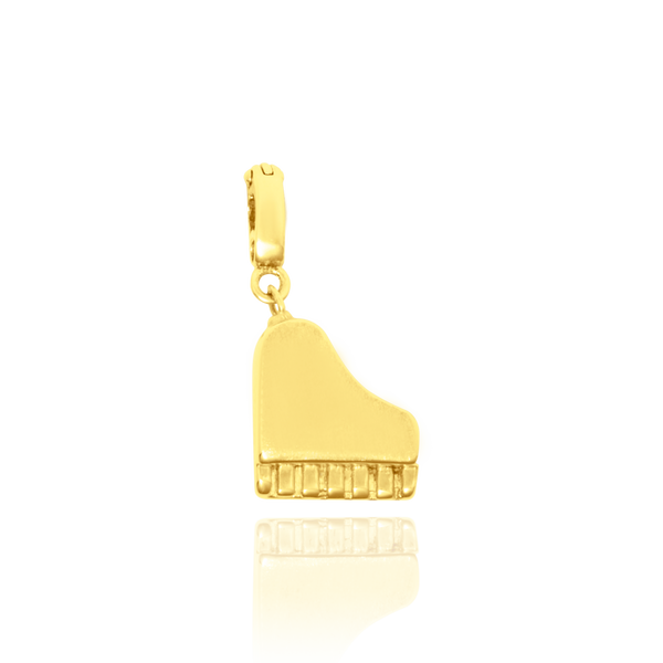 Pendentif en forme de piano en Or Jaune 18 Carats - 750/000.     CARACTERISTIQUES :  Dimensions H x l (mm) : 12.3 x 11.4 Poids (gr) : 1.43 Matière : Or 18 Carats - 750/000 1487