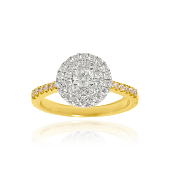 Solitaire, serti de diamants ronds, en Or Blanc et Or Jaune 18 Carats - 750/000   CARACTERISTIQUES :   Largeur du corps (mm) : 2.22 Largeur motif (mm) : 11.00 Poids (gr) : 4.64 Nombre de diamants: 42  -  Carats: 0.534     Diamant central : 1 - Carats : 0.260 Matière : Or 18 Carats - 750/000 18325