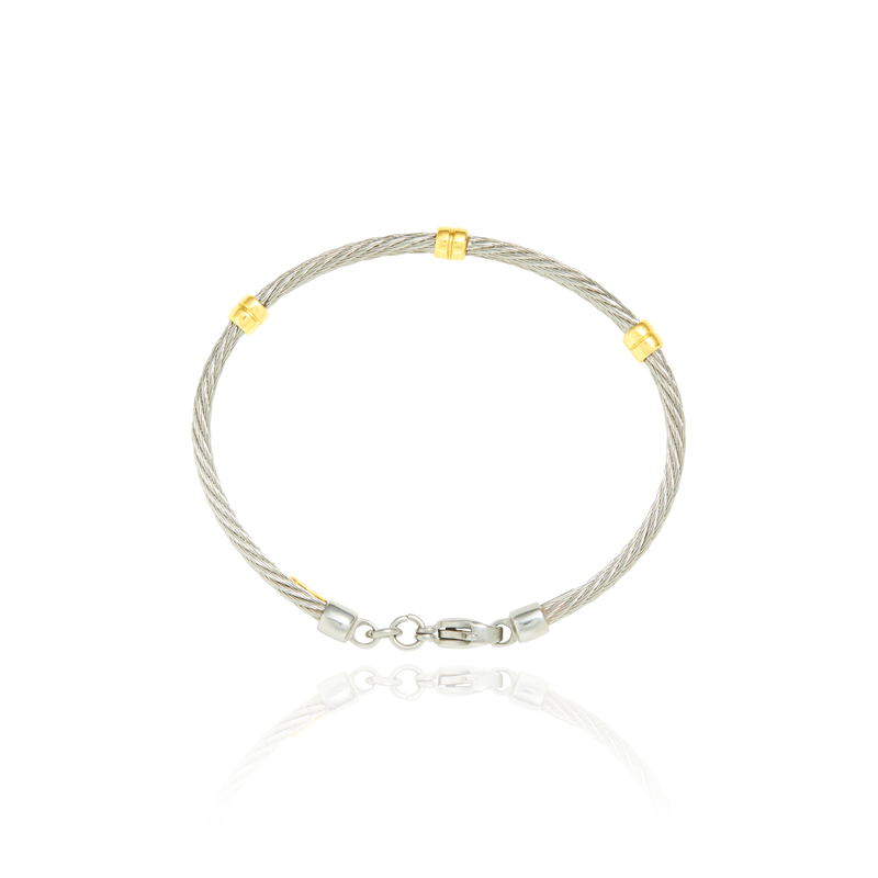Jonc pour enfant en Acier, serti de 3 inserts en Or Jaune massif 18 Carats - 750/000.  Qu'il soit classique ou fantaisiste, le bracelet saura sans conteste faire plaisir.  CARACTERISTIQUES :  Diamètre jonc (cm) : 4.70  Poids (gr) : 6.12  Matière : Or 18 Carats - 750/000  19011
