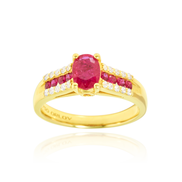 Solitaire, serti d'un rubis central ovale, de rubis ronds et de diamants ronds, en Or Jaune 18 Carats- 750/000   CARACTERISTIQUES :   Largeur du corps (mm) : 3.20 Motif (h x L) mm : 7.10 x 5.25  Poids (gr) : 5.71 Nombre de Rubis (au centre) : 1  -  Carats : 1 Nombre de diamants : 20  -  Carats : 0.200 Nombre de rubis : 8  -  Carats : 0.312 Matière : Or 18 Carats - 750/000 19361
