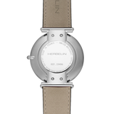 REF: 19406/15BL  Epsilon, modèle simple et épuré, symbolise la mode française intemporelle du luxe. Munie d’un boîtier en acier de 38mm, cette montre est habillée d’un cadran soleillé bleu marqué d’index argent. Montée sur un bracelet en cuir bleu, qui lui confère élégance et distinction. Son design extra plat épouse à merveille les poignets masculins. Son étanchéité est efficace jusqu'à 30 mètres.