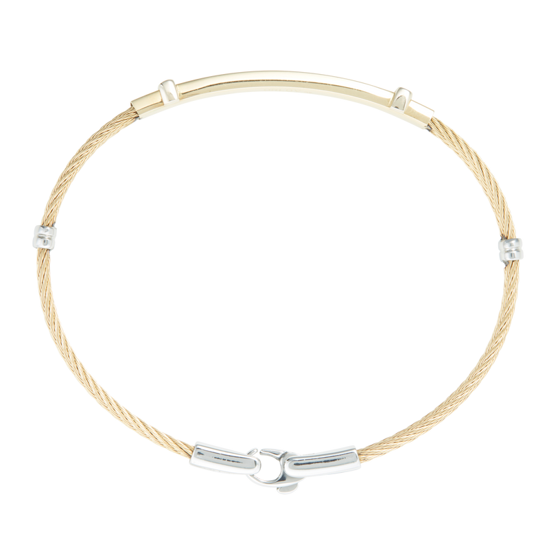 Jonc 2 câbles Acier PVD Doré, motif central en Or Jaune et Or Blanc massif 18 Carats - 750/000.  Qu'il soit classique ou fantaisiste, le bracelet saura sans conteste faire plaisir.  CARACTERISTIQUES :  Epaisseur câble (mm) : 2.00 Diamètre jonc (cm) : 6.50 Poids d'or (gr) : 2.90 Matière : Acier et Or 18 Carats - 750/000 Couleur câble : Doré 19542