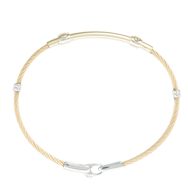 Jonc 2 câbles Acier PVD Doré, motif central en Or Jaune et Or Blanc massif 18 Carats - 750/000.  Qu'il soit classique ou fantaisiste, le bracelet saura sans conteste faire plaisir.   CARACTERISTIQUES :  Epaisseur câble (mm) : 2.00 Diamètre jonc (cm) : 6.50 Couleur câble : Acier PVD Doré Poids d'or (gr) : 3.70 Matière : Acier et Or 18 Carats - 750/000 19545