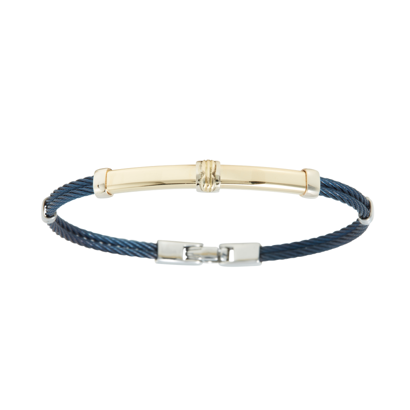 Jonc 2 câbles Acier PVD Bleu, motif central en Or Jaune et Or Blanc 18 Carats massif.  Qu'il soit classique ou fantaisiste, le bracelet saura sans conteste faire plaisir.   CARACTERISTIQUES :  Epaisseur câble (mm) : 2.00 Diamètre jonc (cm) : 7.00 Couleur câble : Acier PVD Bleu Poids d'or (gr) : 4.20 Matière : Acier et Or 18 Carats - 750/000 19544 