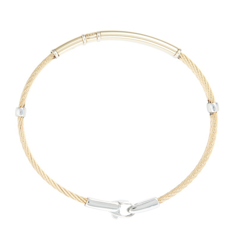 Jonc 3 câbles Acier PVD Doré, motif central en Or Jaune et Or Blanc massif 18 Carats - 750/000.  Qu'il soit classique ou fantaisiste, le bracelet saura sans conteste faire plaisir.   CARACTERISTIQUES :  Epaisseur câble (mm) : 2.00 Diamètre jonc (cm) : 6.50 Couleur câble : Acier PVD Doré Poids d'or (gr) : 3.70 Matière : Acier et Or 18 Carats - 750/000 19545