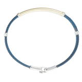 Jonc 3 câbles Acier PVD Bleu, motif central en Or Jaune et Or Blanc massif  18 Carats - 750/000.  Qu'il soit classique ou fantaisiste, le bracelet saura sans conteste faire plaisir.  Possibilité de gravure personnalisée.   CARACTERISTIQUES :  Epaisseur câble (mm) : 2.00 Diamètre jonc (cm) : 6.50 Couleur câble : PVD Bleu Poids d'or (gr) : 4.40 Matière : Acier et Or 18 Carats - 750/000 19546