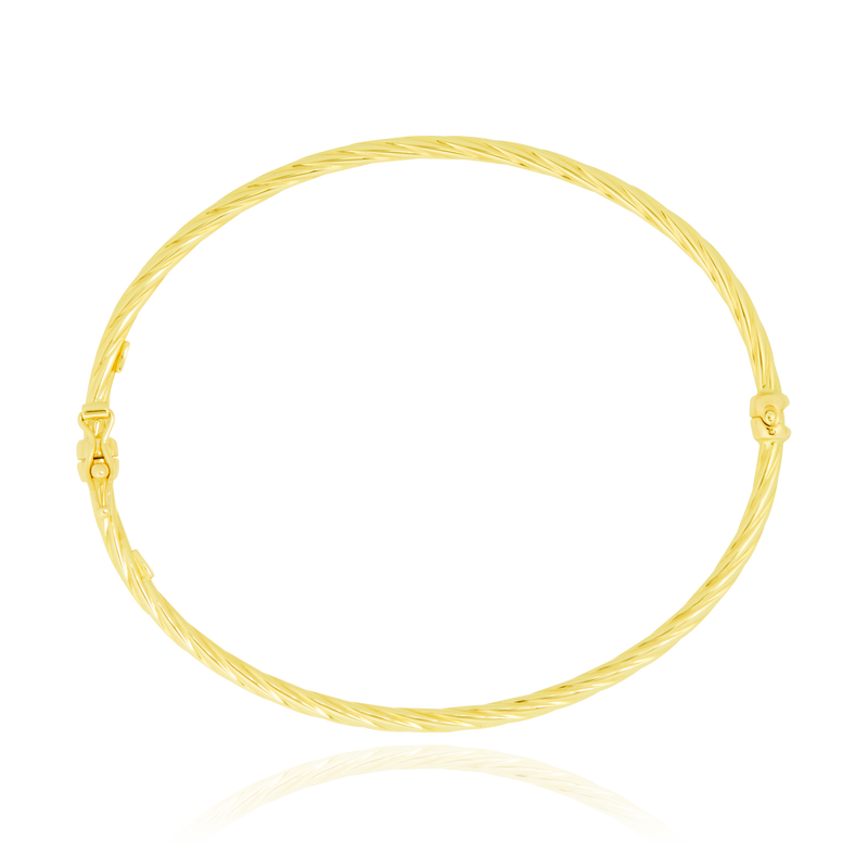 Jonc torsadé en Or Jaune 18 Carats - 750/000.  Qu'il soit classique ou fantaisiste, le bracelet saura sans conteste faire plaisir.  CARACTERISTIQUES :  Diamètre jonc (cm) : 6.00 Poids (gr) : 3.62 Matière : Or 18 Carats - 750/000 19973