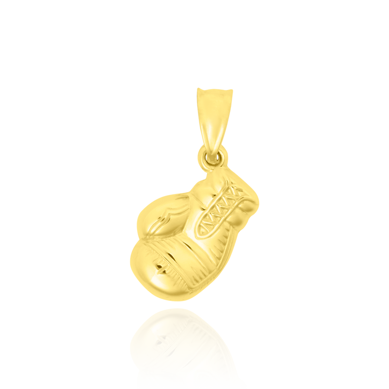 Pendentif en forme de Gant de boxe en Or Jaune 18 Carats - 750/000.     CARACTERISTIQUES :  Dimensions H x l (mm) : 14.5 x 10 Poids (gr) : 0.88 Matière : Or 18 Carats - 750/000 19989 