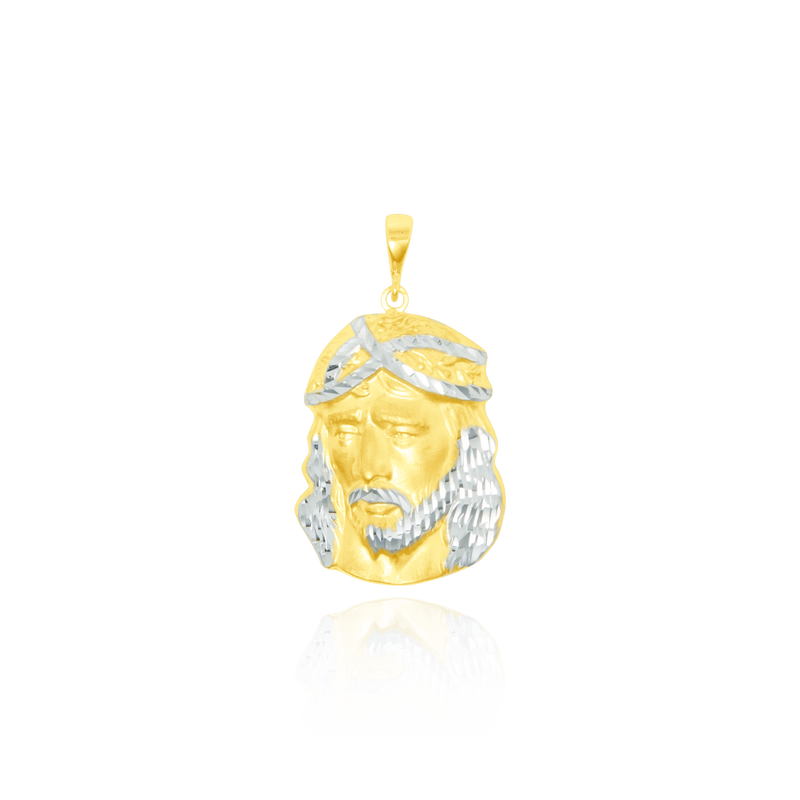 Pendentif en forme de portrait de Jésus en Or Jaune et Or Blanc 18 Carats - 750/000.    CARACTERISTIQUES :  Dimensions H x l (mm) : 26.7 x 20.90 Poids (gr) : 5.67 Matière : Or 18 Carats - 750/000 19991 