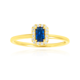 Solitaire rectangle serti d'un zirconium central bleu, couronné de zirconiums, en Or Jaune 18 Carats- 750/000   CARACTERISTIQUES :  Motif central (mm) : 5.69 x 7.22 Epaisseur (mm) : 1.47 Poids (gr) : 2.26    Matière : Or 18 Carats - 750/000 20037