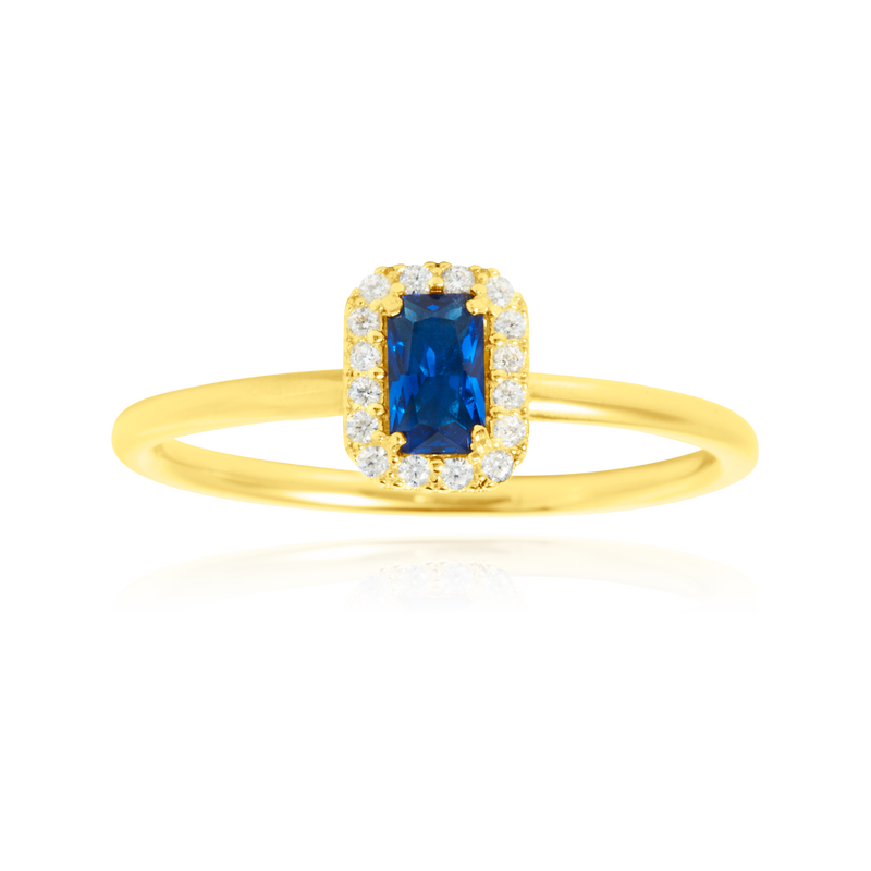 Solitaire rectangle serti d'un zirconium central bleu, couronné de zirconiums, en Or Jaune 18 Carats- 750/000   CARACTERISTIQUES :  Motif central (mm) : 5.69 x 7.22 Epaisseur (mm) : 1.47 Poids (gr) : 2.26    Matière : Or 18 Carats - 750/000 20037