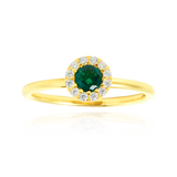 Solitaire rond serti d'un zirconium central vert, couronné de zirconiums, en Or Jaune 18 carats 750/000   CARACTERISTIQUES :  Motif central (mm) : 6.95 Epaisseur (mm) : 1.52 Poids (gr) : 2.27       Matière : Or 18 Carats - 750/000  20039