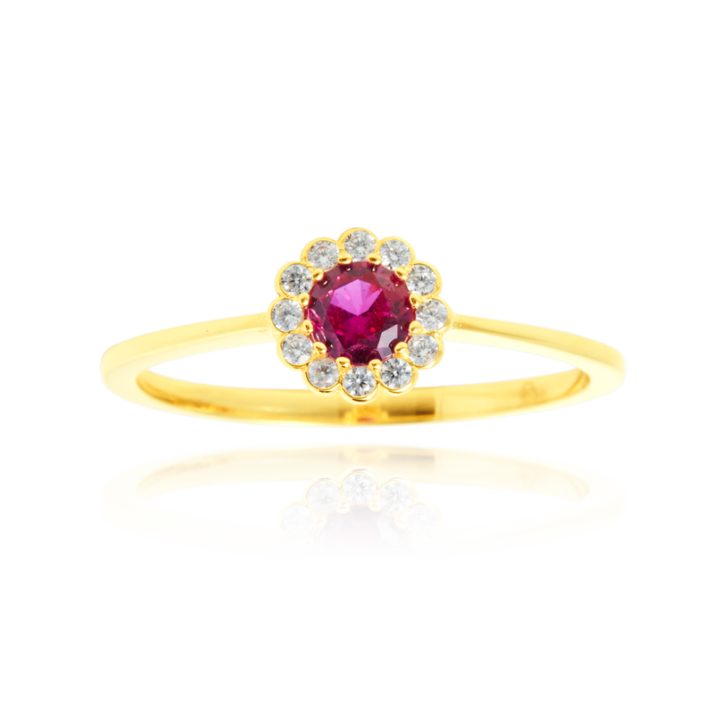 Solitaire rond serti d'un zirconium central rouge, couronné de zirconiums en forme de fleur, en Or Jaune 18 carats 750/000   CARACTERISTIQUES :  Motif central (mm) : 7.0 Epaisseur (mm) : 1.32 Poids (gr) : 1.66         Matière : Or 18 Carats - 750/000 20041