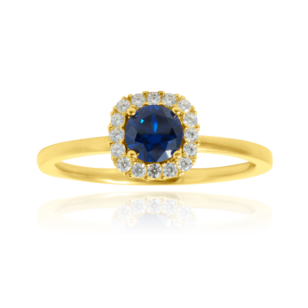 Bague sertie de zirconium bleu, couronnée d'une carré de zirconiums, en Or Jaune 18 Carats- 750/000   CARACTERISTIQUES :  Motif central (mm) : 8.03 Epaisseur (mm) : 1.40 Poids (gr) : 2.78        Matière : Or 18 Carats - 750/000 20068