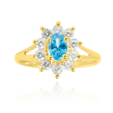 Bague marquise sertie d'un zirconium central bleu topaze et de zirconiums blancs, en Or Jaune 18 Carats - 750/000.  Cinq possibilités d'embellir vos doigts, portez une de nos bagues.   CARACTERISTIQUES :  Motif central (mm) : 10.94 x 12.24 Epaisseur (mm) : 1.85 Poids (gr) : 2.28       Matière : Or 18 Carats - 750/000 20211