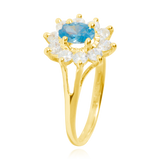 Bague marquise sertie d'un zirconium central bleu topaze et de zirconiums blancs, en Or Jaune 18 Carats - 750/000.  Cinq possibilités d'embellir vos doigts, portez une de nos bagues.   CARACTERISTIQUES :  Motif central (mm) : 10.94 x 12.24 Epaisseur (mm) : 1.85 Poids (gr) : 2.28       Matière : Or 18 Carats - 750/000 20211