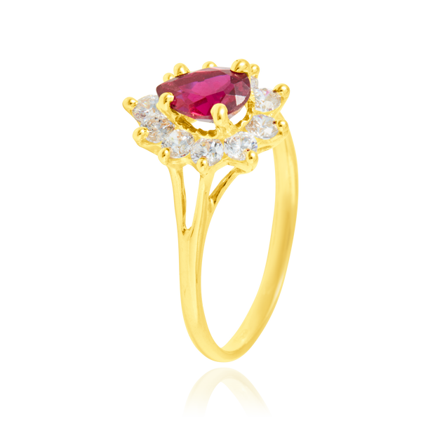 Bague marquise sertie de zirconium poire rouge et de zirconiums blancs, en Or Jaune 18 Carats - 750/000.  Cinq possibilités d'embellir vos doigts, portez une de nos bagues.   CARACTERISTIQUES :  Motif central (mm) : 12.72 Epaisseur (mm) : 1.88 Poids Moyen (gr) : 2.38      Matière : Or 18 Carats - 750/000 20232