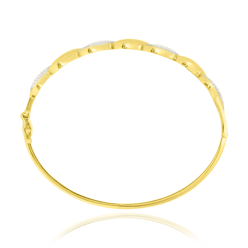 Jonc motifs vagues sertis de zirconiums, en Or Jaune et Or Blanc 18 Carats - 750/000.  Qu'il soit classique ou fantaisiste, le bracelet saura sans conteste faire plaisir.  CARACTERISTIQUES :  Diamètre jonc (cm) : 6.00 Poids (gr) : 8.68 Matière : Or 18 Carats - 750/000 20262 