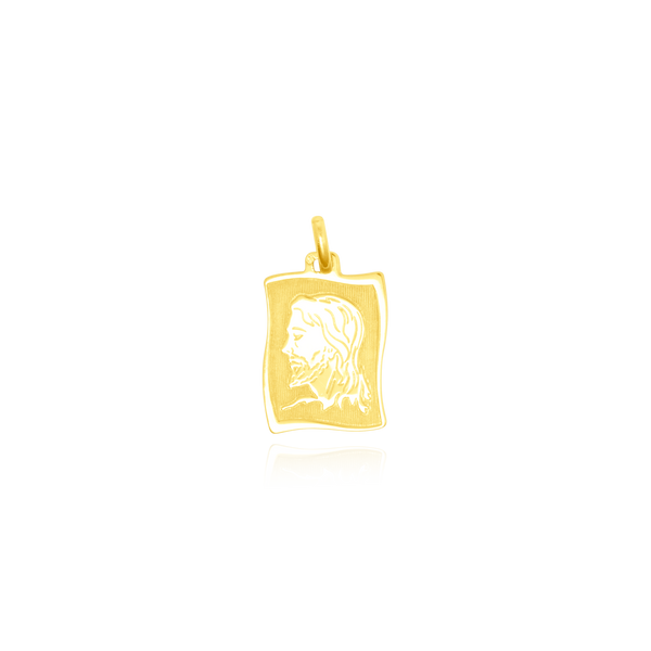 Pendentif en forme de portrait de Jésus en Or Jaune 18 Carats - 750/000.      CARACTERISTIQUES :  Dimensions H x l (mm) : 19.5 x 14.6 Poids (gr) : 2.97 Matière : Or 18 Carats - 750/000 3545